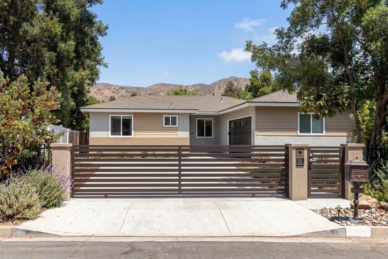Bronze horizontal slat residential sliding gate, SCV hills backdrop